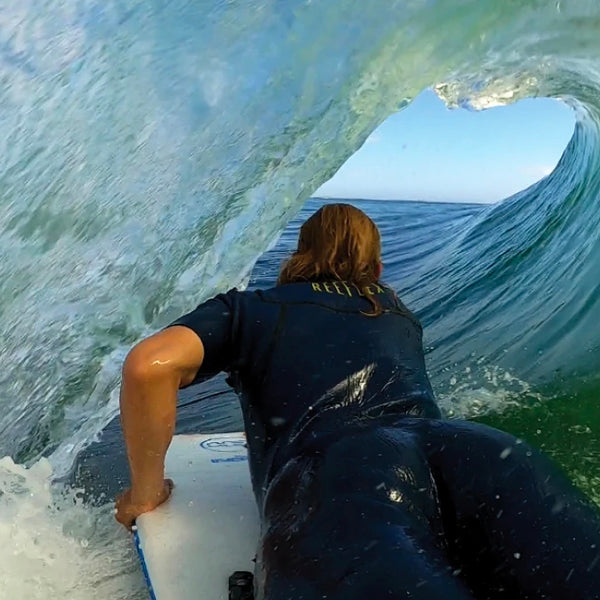 Peeking out the glass on a Hot Buttered bodyboard.  Boogie